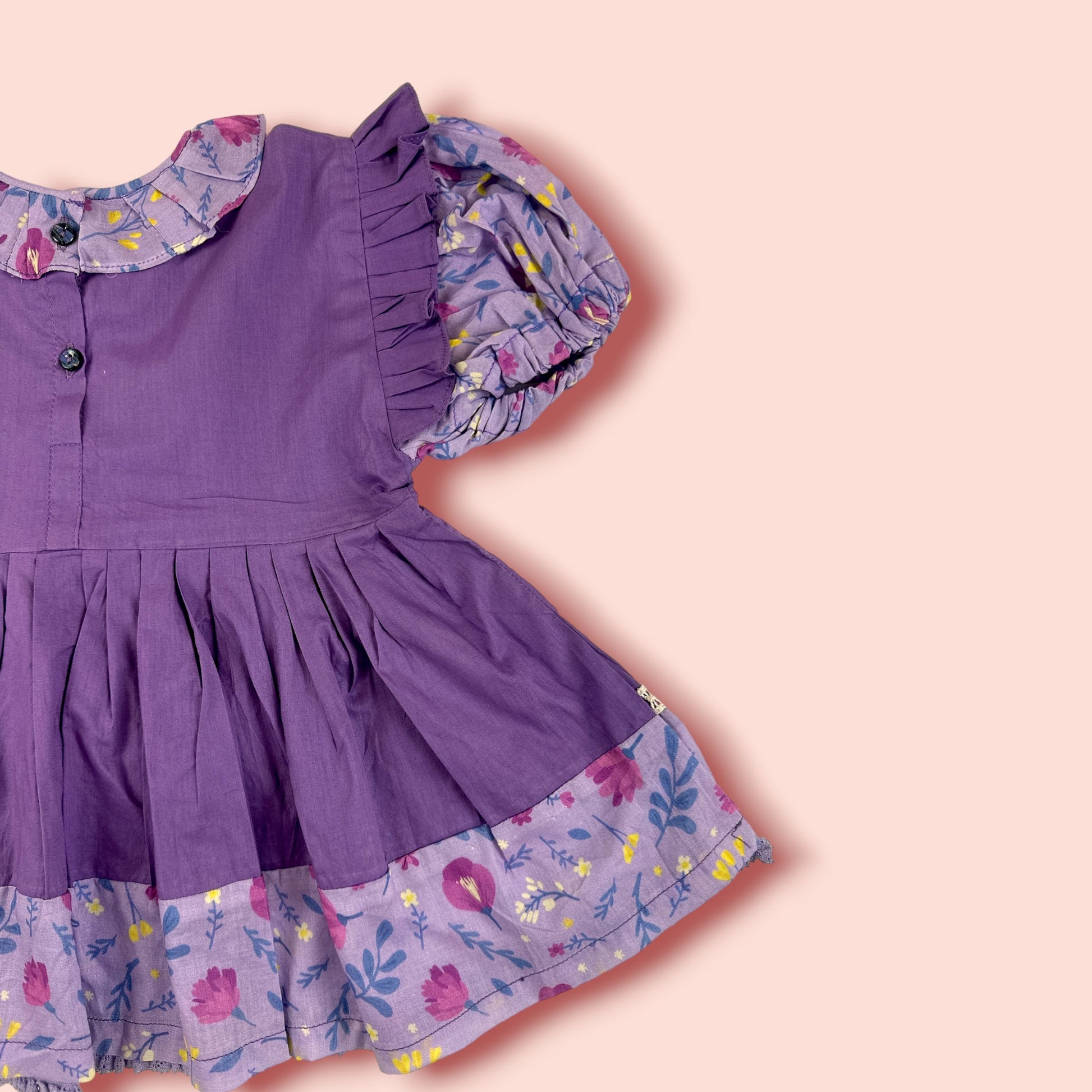 half side view of Purple Floral Printed Lawn Frock