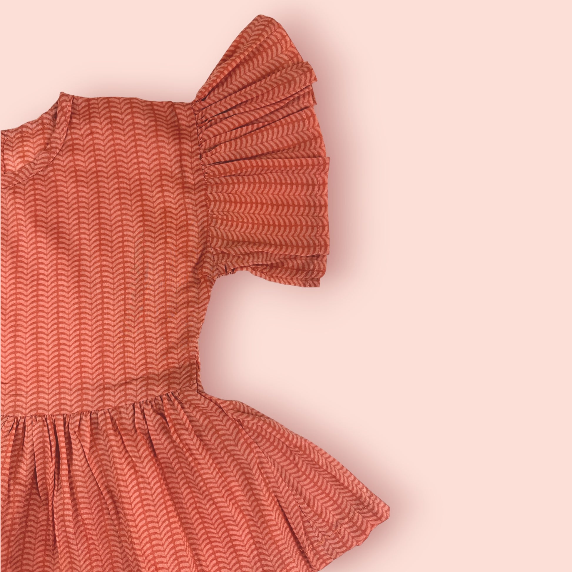 shoulder view of Natural Peach Colour Printed Frock 2 PC Set