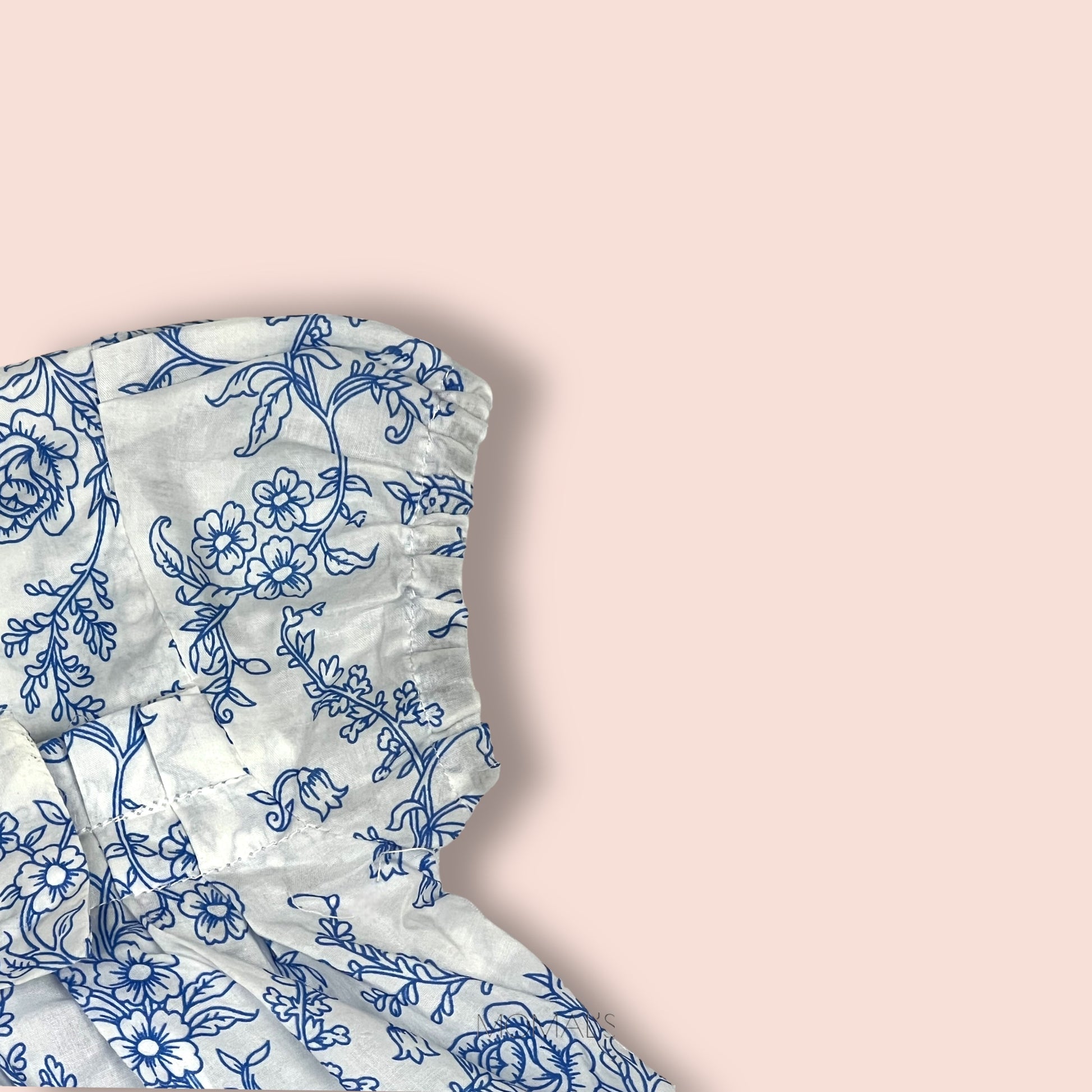 shoulder view of Printed Blue and White Frock