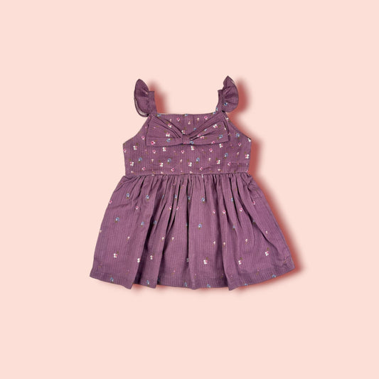 The Purple Floral Lawn Frock is printed with purple flowers